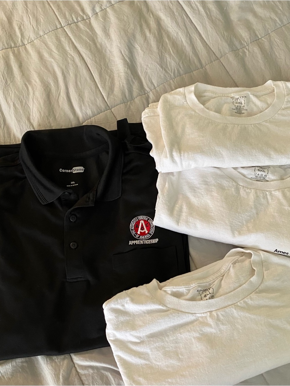 1 Black Polo Shirt/ 3 white short sleeveless